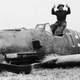 A jubilant British soldier sits in the cockpit of a downed Luftwaffe Bf-109. The thumbs up gesture was similar to Churchill’s famous V for victory. (Author unknown)